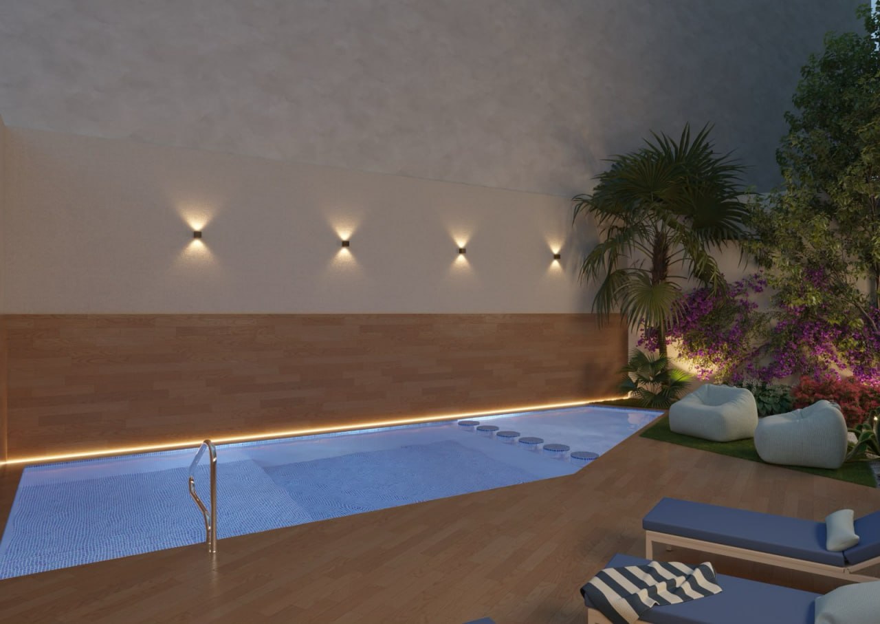 Piscina comunitaria con cubierta de madera y bougainvillea — Prim 3